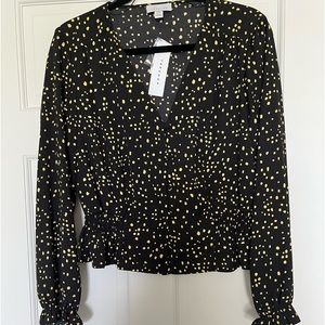 Women’s top.  Brand new.  Size 8.  Black and yellow.